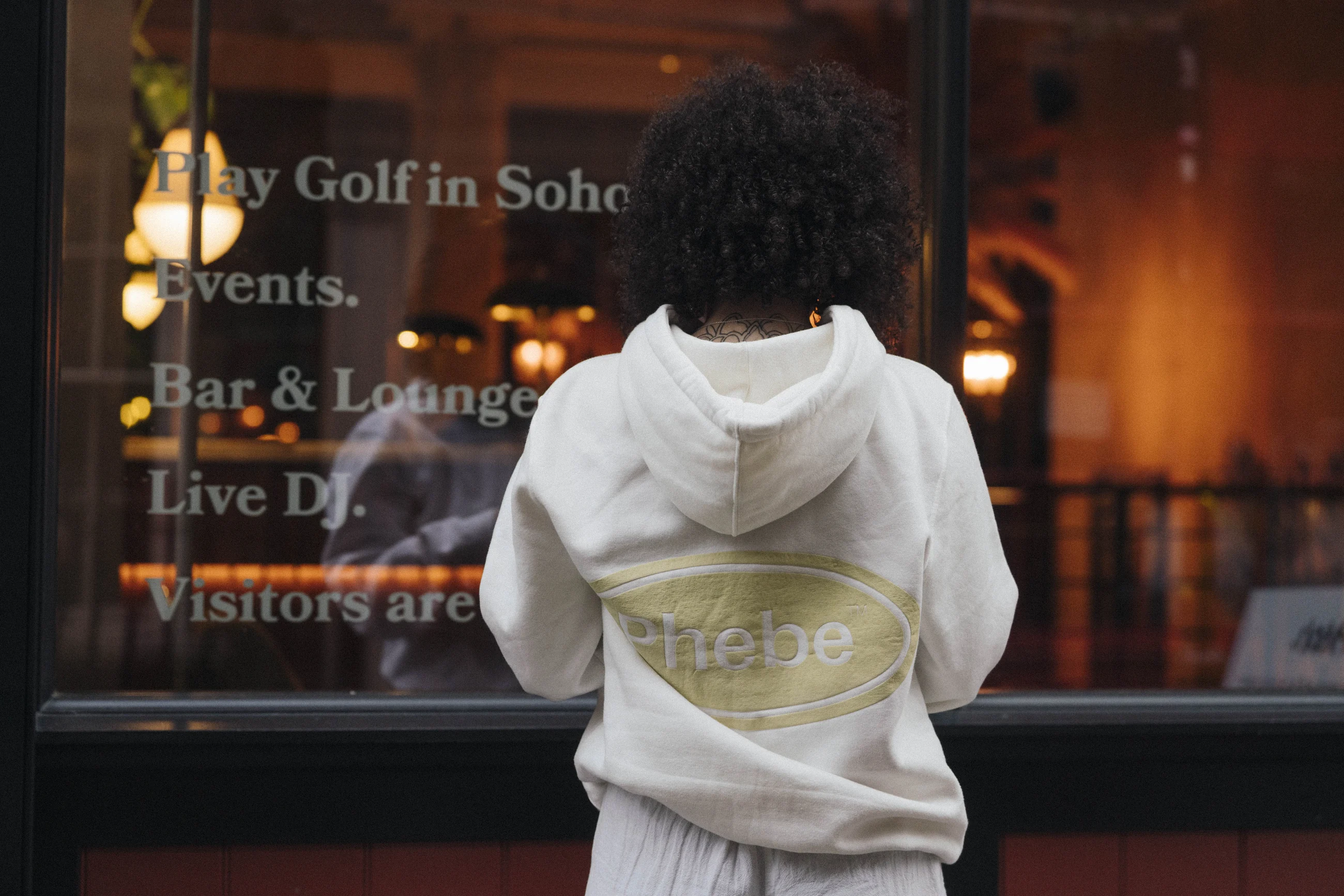 Artist Isabela Santos wearing Phebe Industry in an urban setting